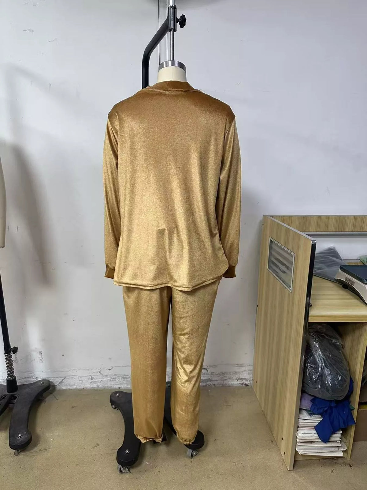 View 6 of the velvet two-piece set with a cowl-neck top and matching pants.