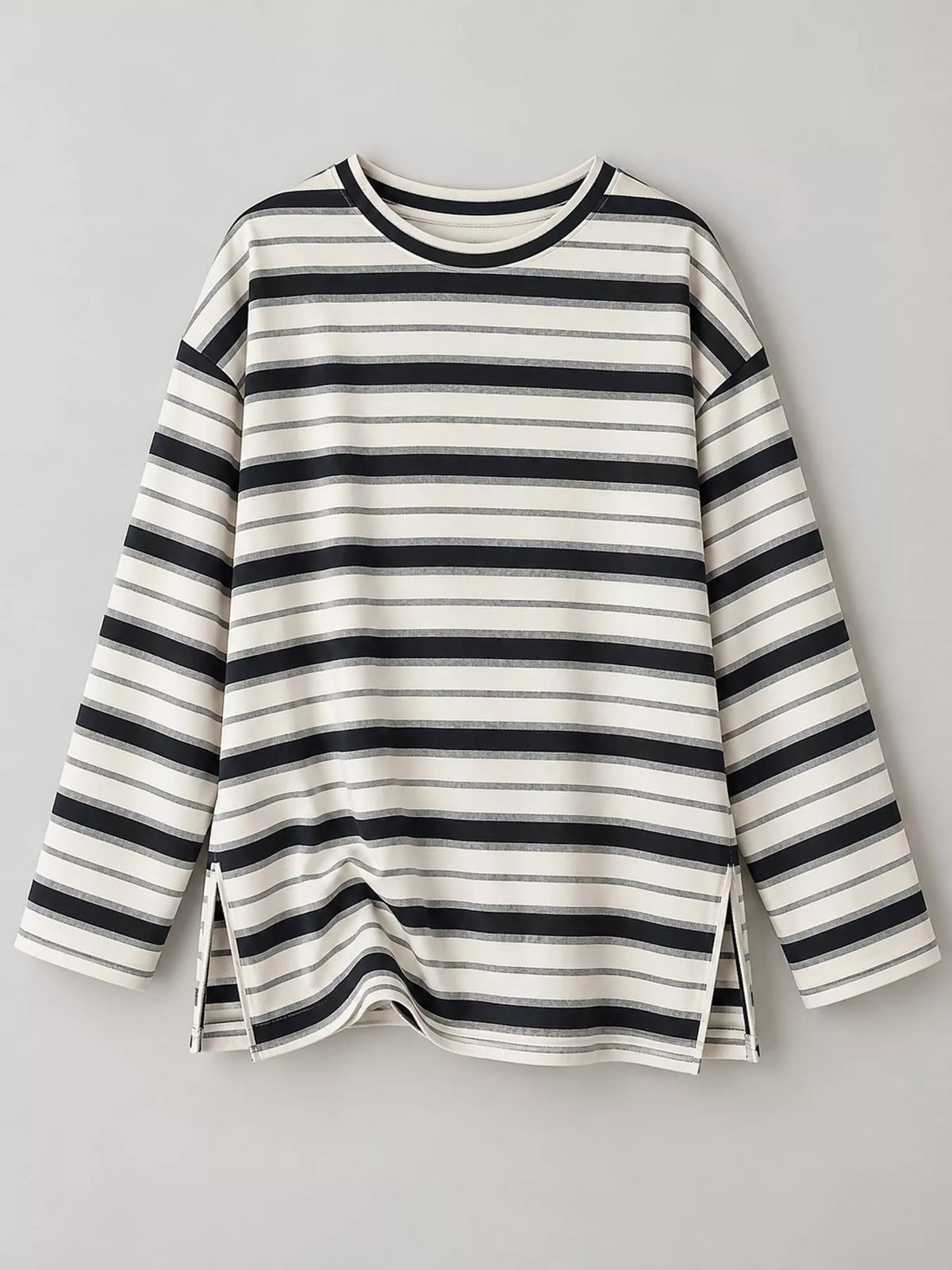 View 5 of the oversized navy-and-cream striped tee with dropped shoulders.