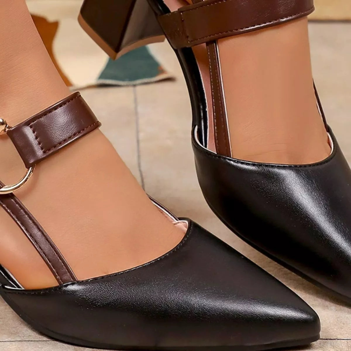 View 7 of the pointed-toe sandals with a mid block heel.