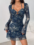 Long-sleeve mesh mini dress with cutouts, a tie, and a lining.