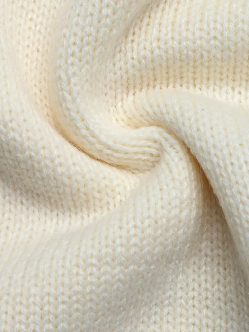 View 11 of the cardigan with Chinese knot buttons and contrast stripes down the sides.