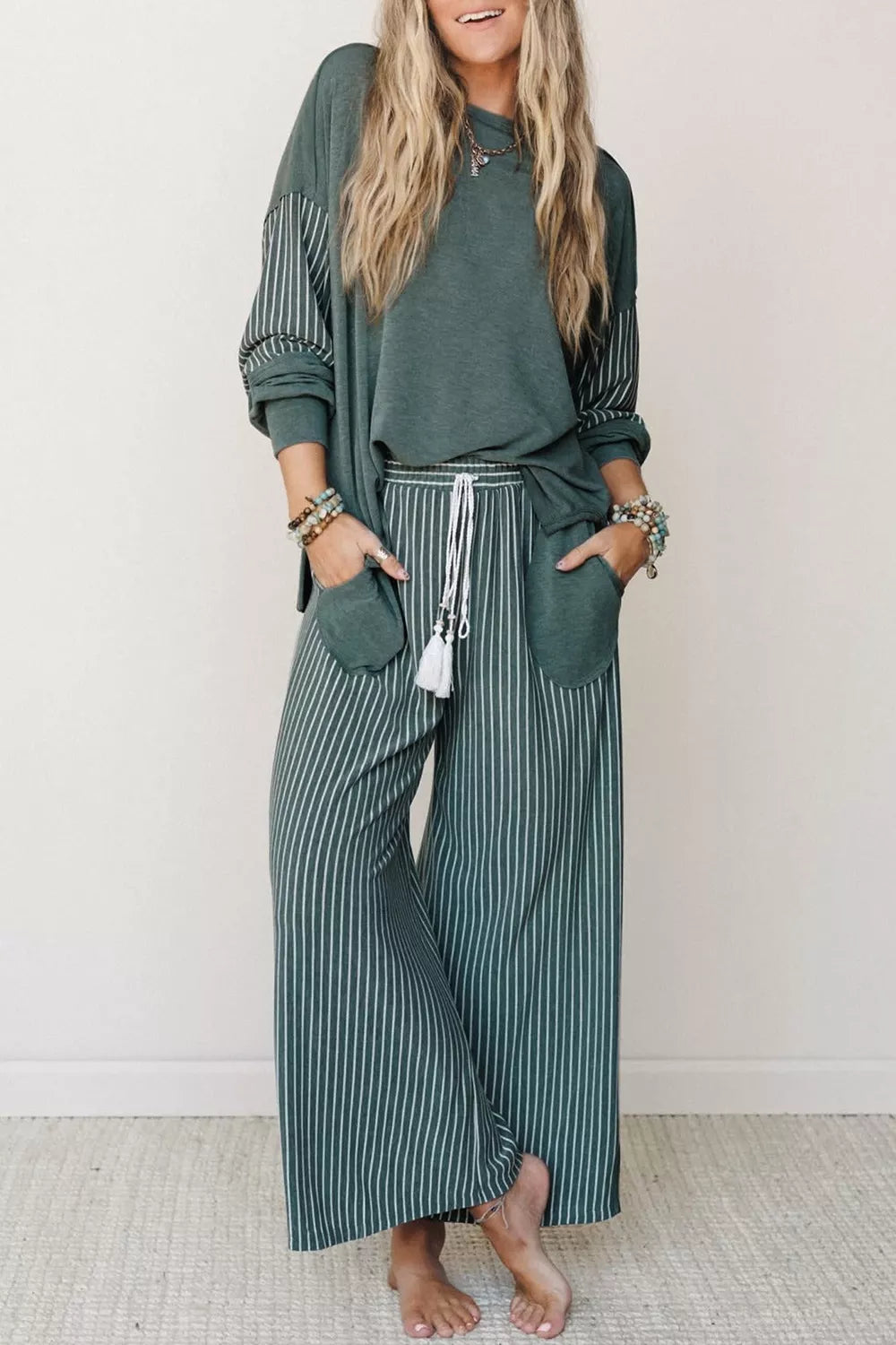 View 6 of the striped two-piece set with a long-sleeve top and drawstring pants.