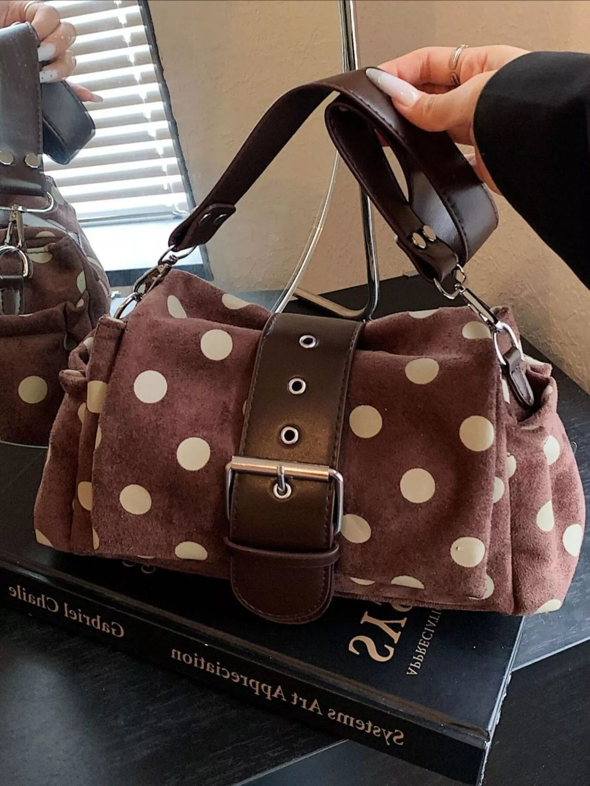 View 2 of the small polka-dot shoulder bag in PU leather.