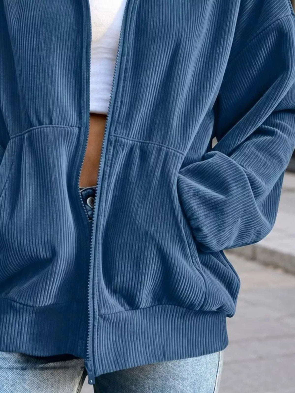 View 18 of the unlined corduroy zip jacket with dropped shoulders and pockets.