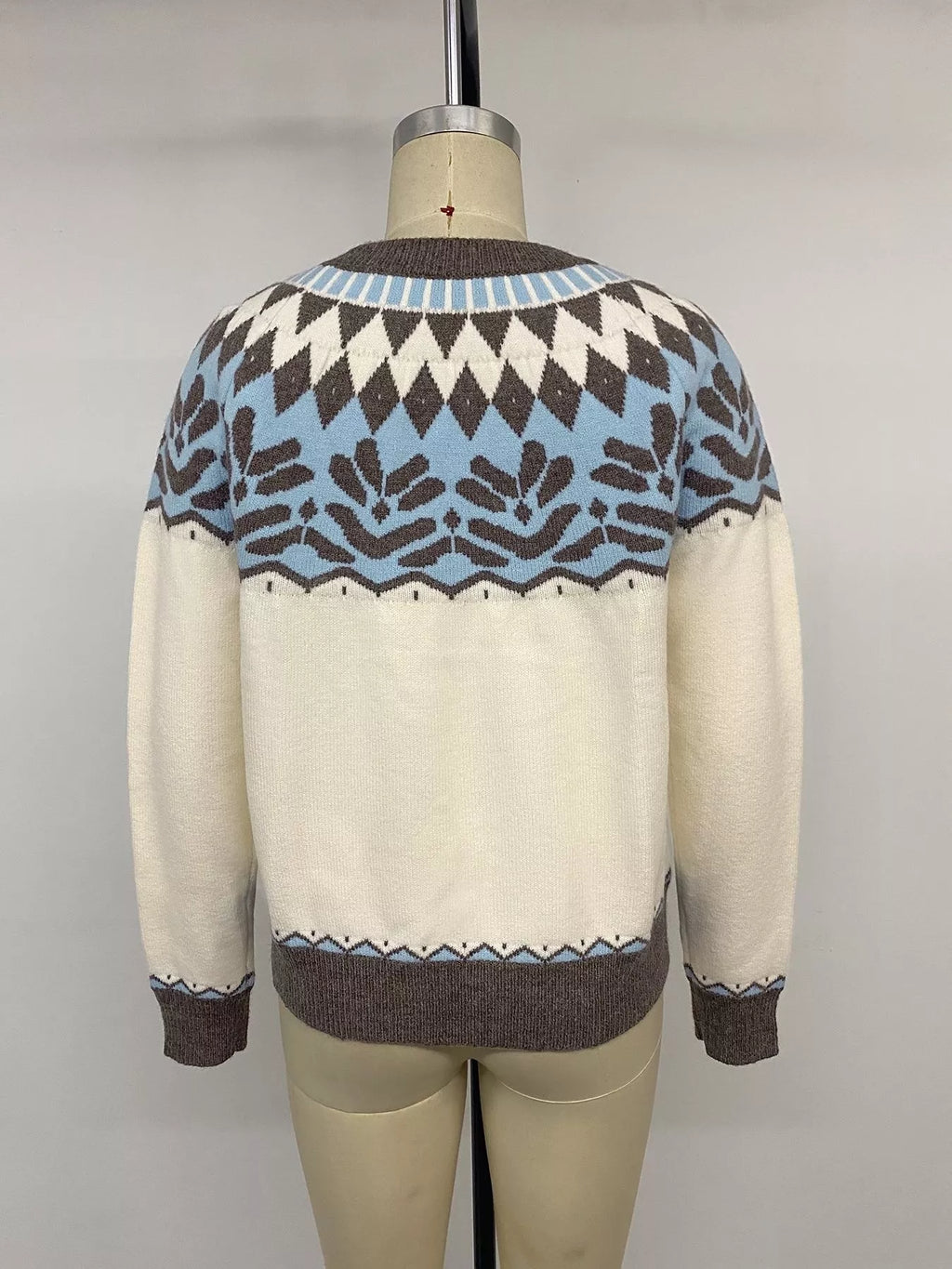 View 12 of the round-neck Fair Isle sweater with the pattern knitted in, not printed.