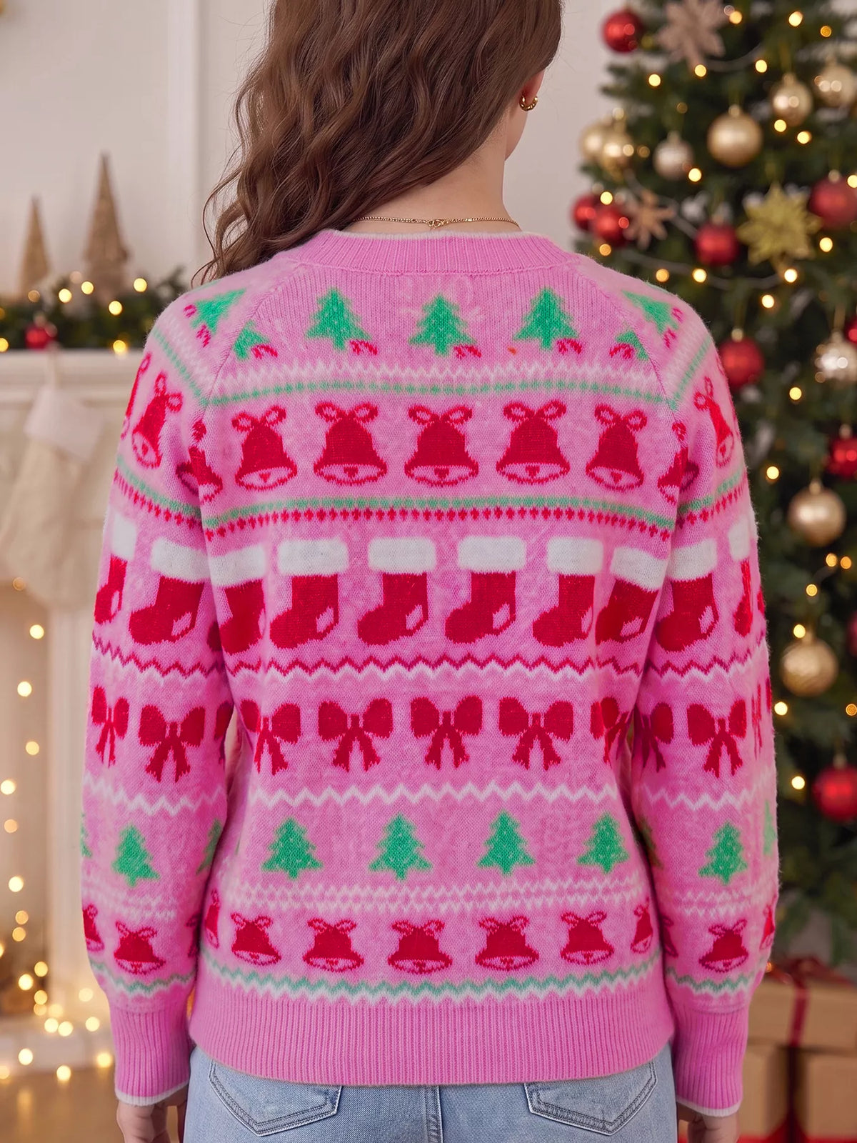 View 2 of the round-neck holiday knit sweater with a graphic across the chest.