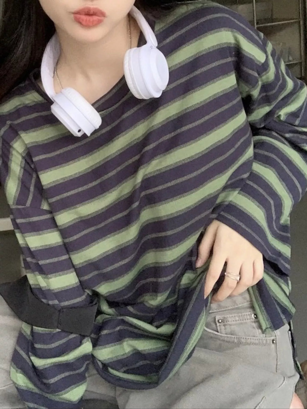 View 9 of the oversized navy-and-cream striped tee with dropped shoulders.