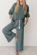 View 5 of the striped two-piece set with a long-sleeve top and drawstring pants.