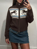 Brown zip mock-neck cardigan with black horses on a cream chest band.