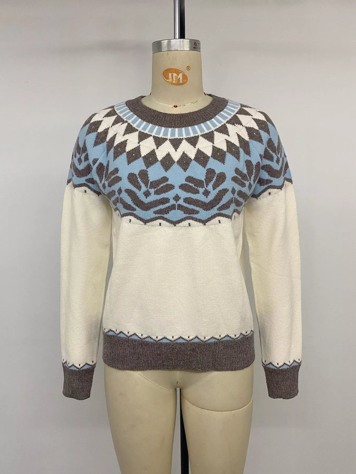 View 10 of the round-neck Fair Isle sweater with the pattern knitted in, not printed.