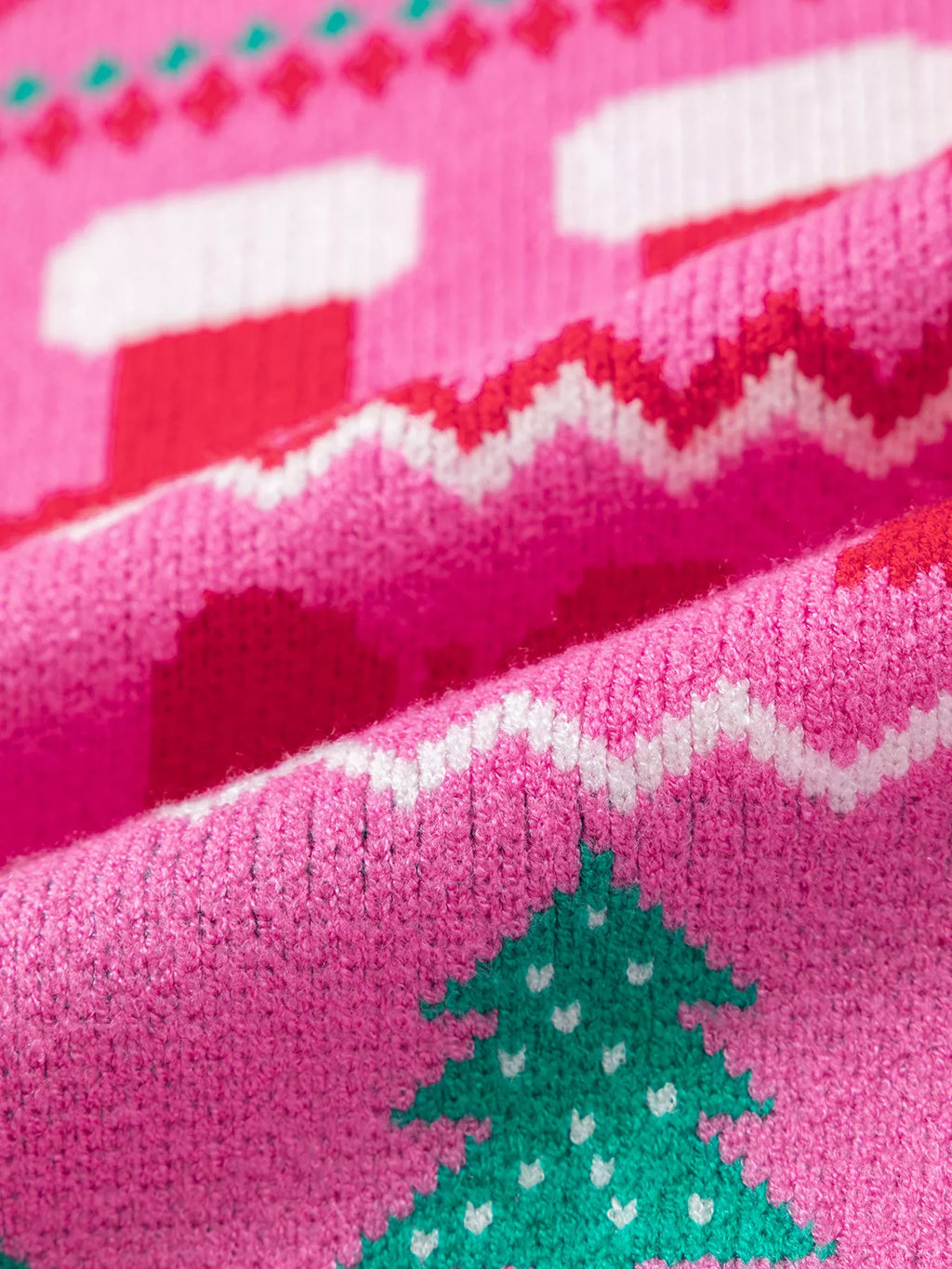 View 7 of the round-neck holiday knit sweater with a graphic across the chest.
