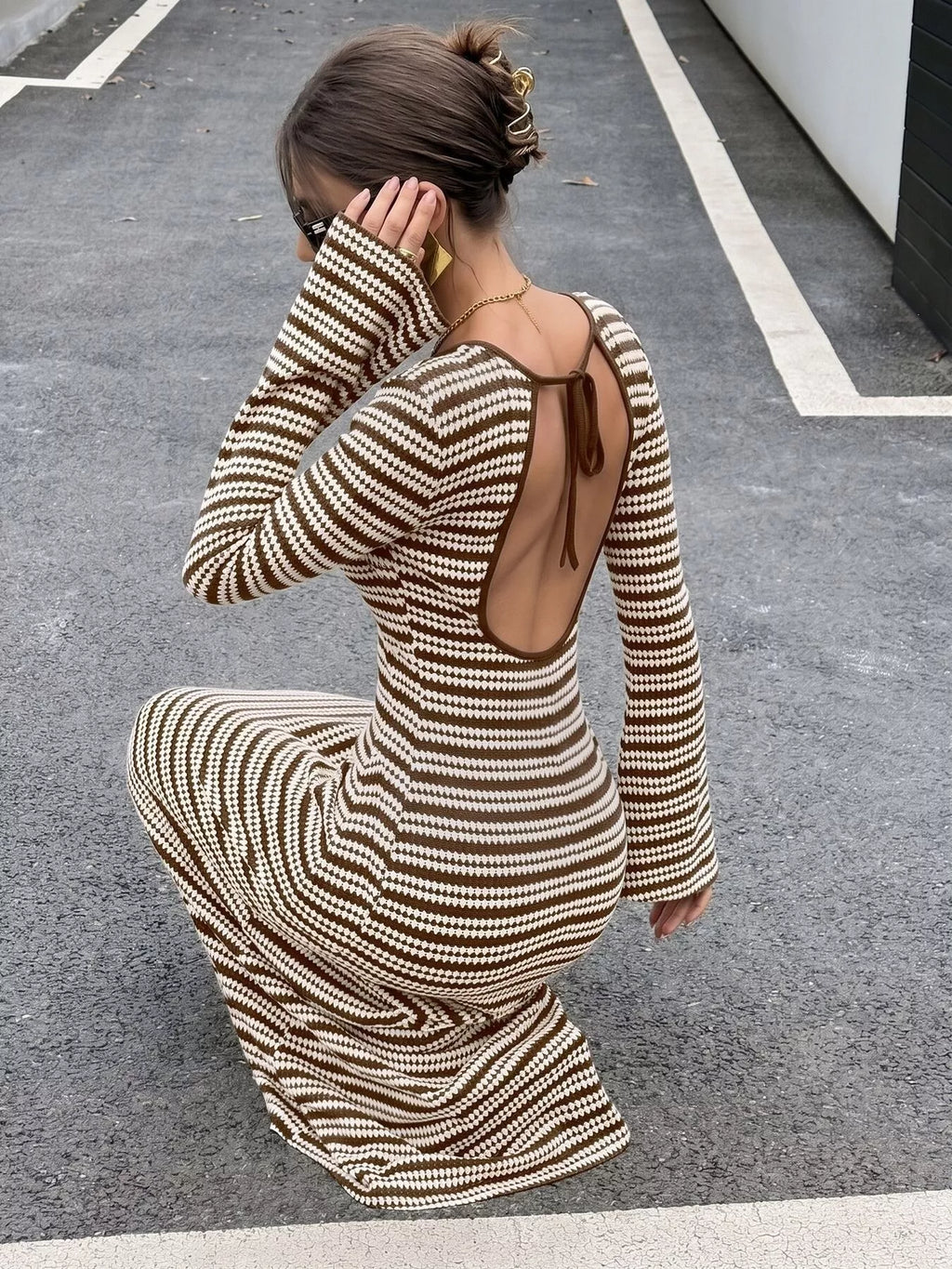 View 4 of the striped ribbed knit dress with flare sleeves.