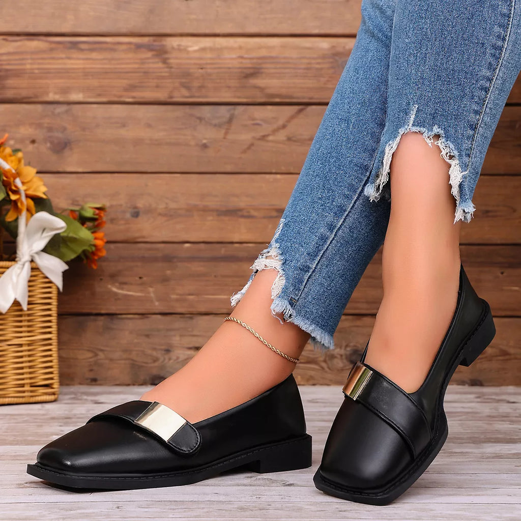 View 2 of the square-toe slip-on shoes with a low heel.