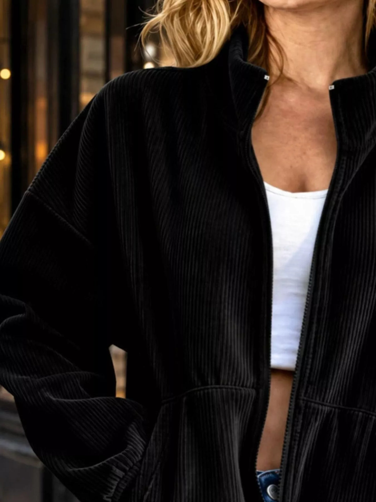 View 2 of the unlined corduroy zip jacket with dropped shoulders and pockets.