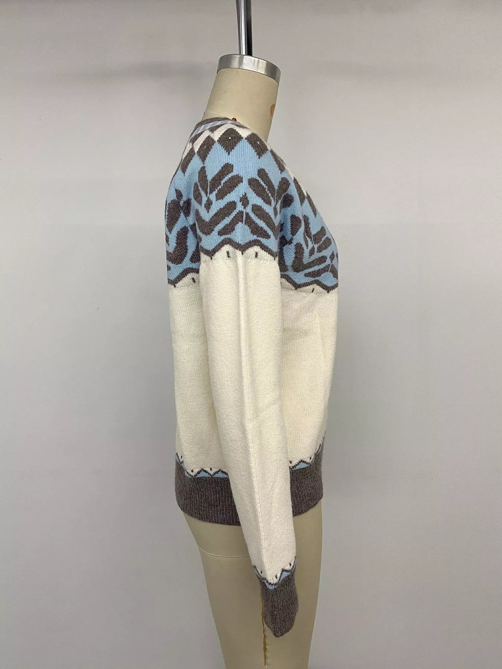 View 11 of the round-neck Fair Isle sweater with the pattern knitted in, not printed.