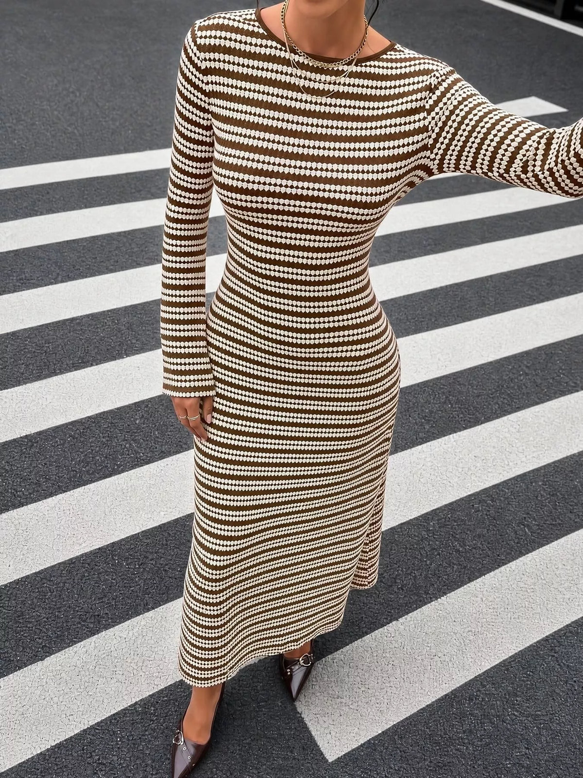 View 3 of the striped ribbed knit dress with flare sleeves.