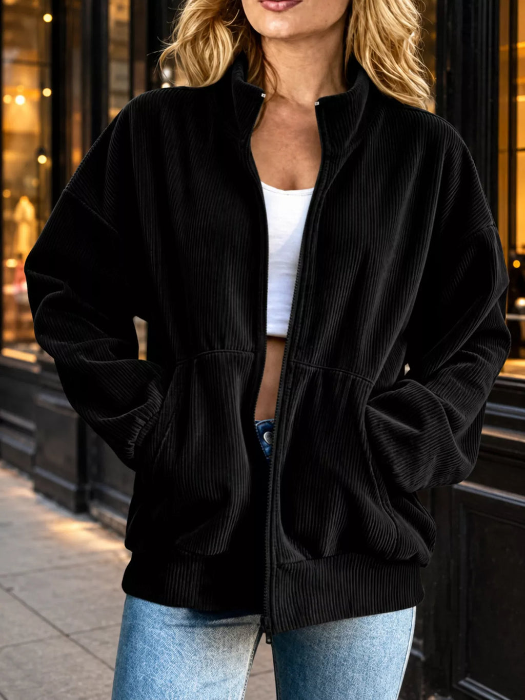 Unlined corduroy zip jacket with dropped shoulders and pockets.