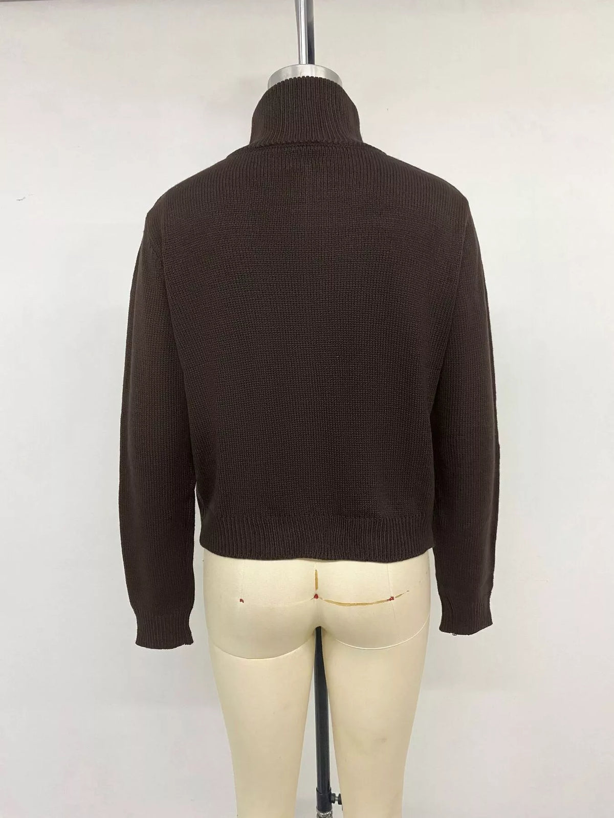 View 13 of the brown zip mock-neck cardigan with black horses on a cream chest band.