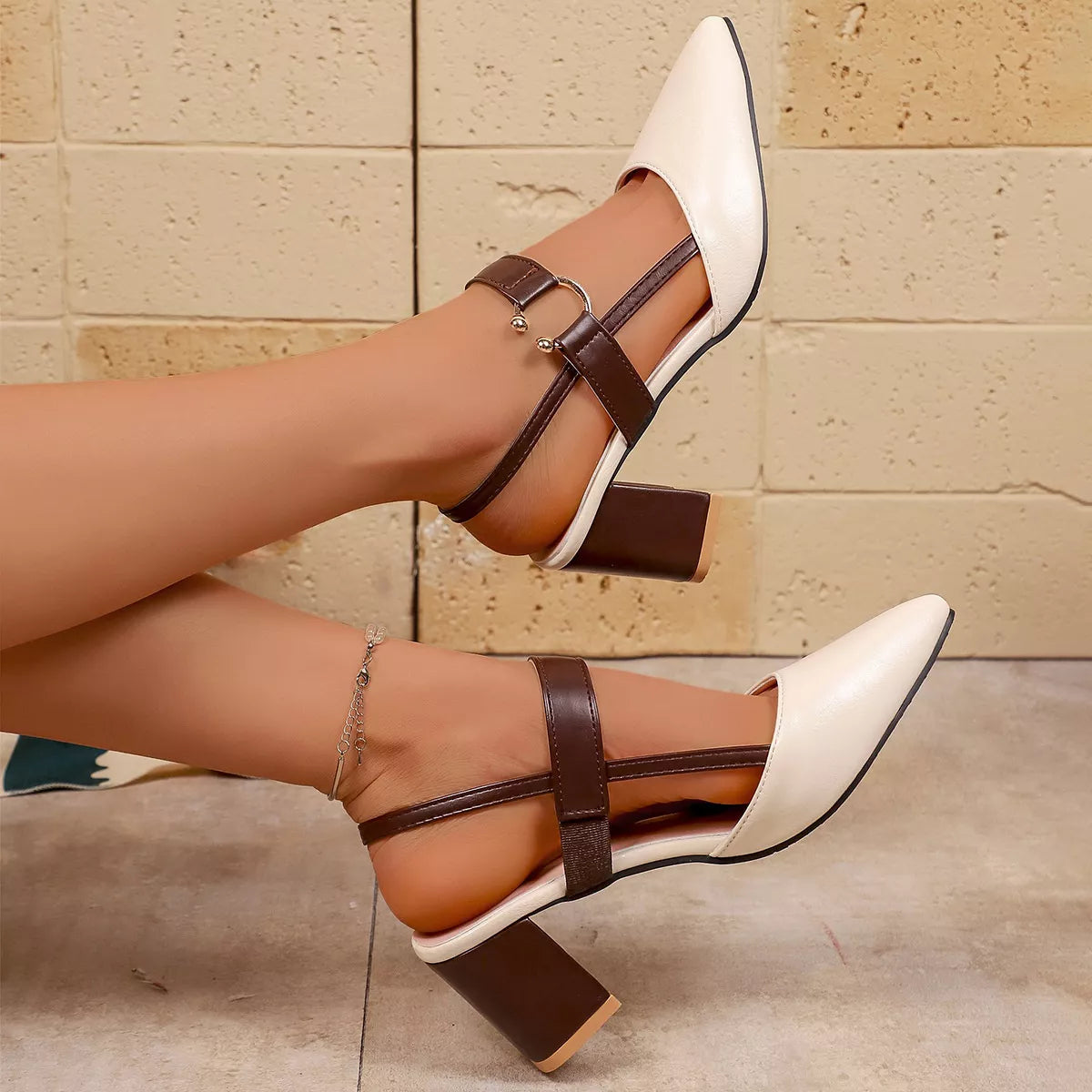 View 5 of the pointed-toe sandals with a mid block heel.