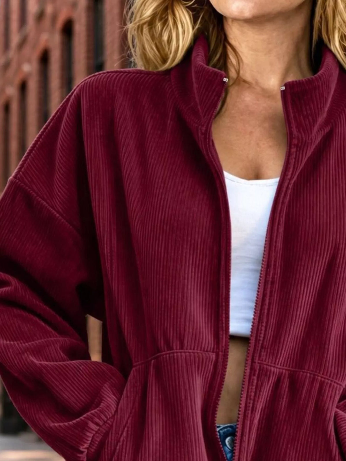 View 5 of the unlined corduroy zip jacket with dropped shoulders and pockets.