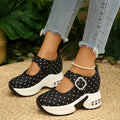 Polka-dot platform loafers with a rhinestone buckle.