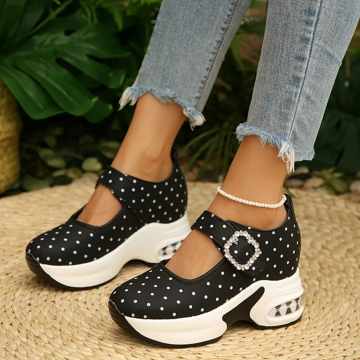 Polka-dot platform loafers with a rhinestone buckle.