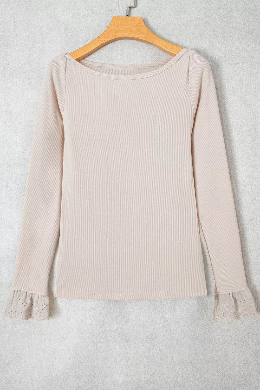 View 5 of the fitted beige ribbed long-sleeve top with eyelet lace cuffs.