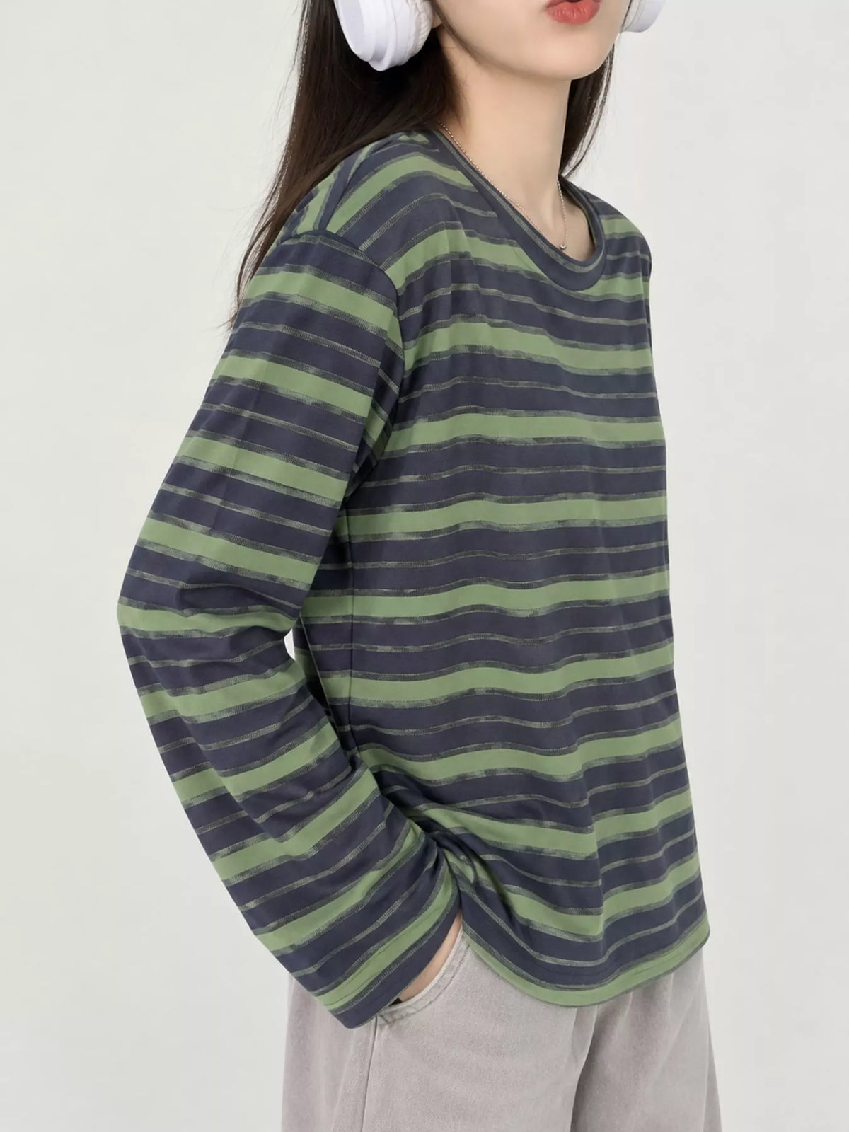 View 10 of the oversized navy-and-cream striped tee with dropped shoulders.