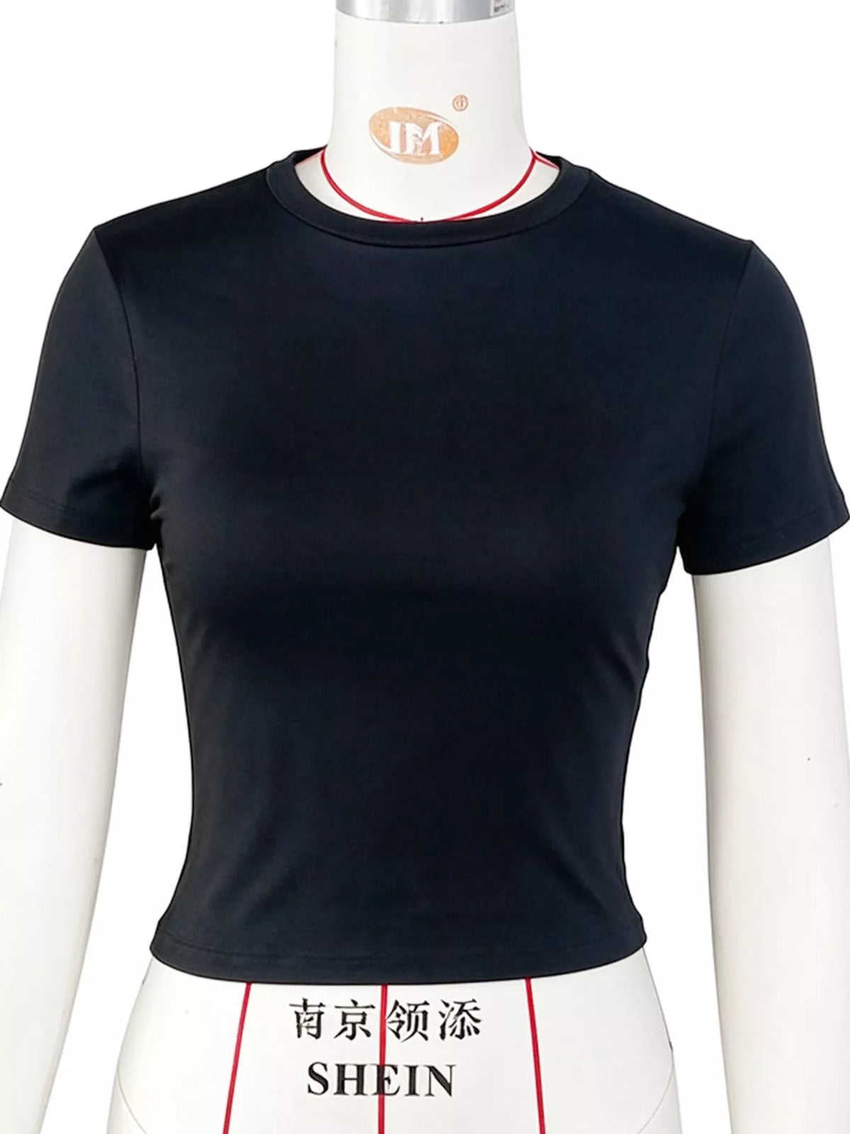 View 9 of the plain short-sleeve crewneck crop tee.