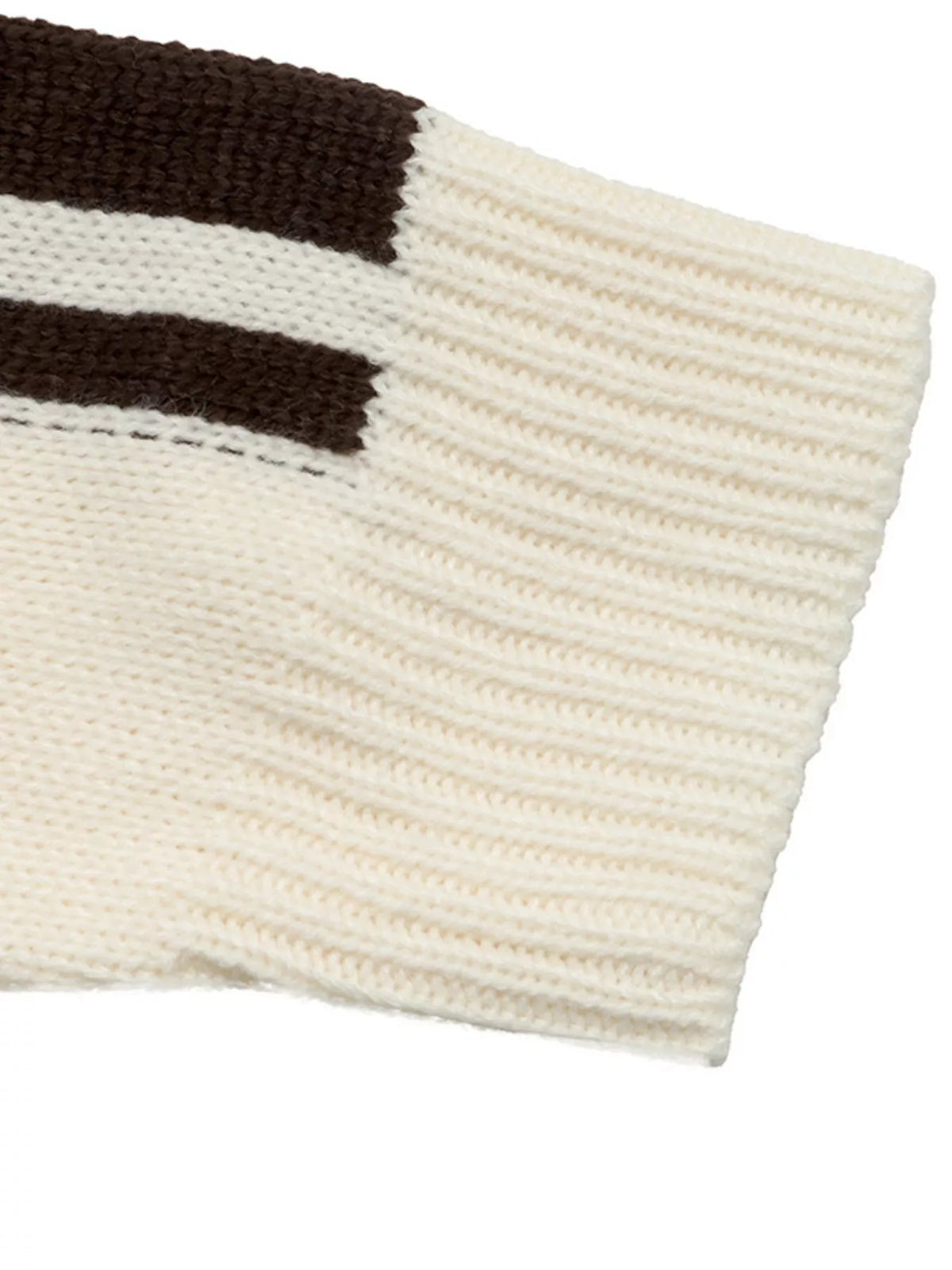 View 8 of the cardigan with Chinese knot buttons and contrast stripes down the sides.
