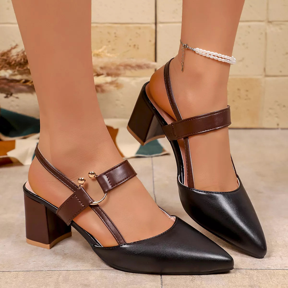 View 6 of the pointed-toe sandals with a mid block heel.